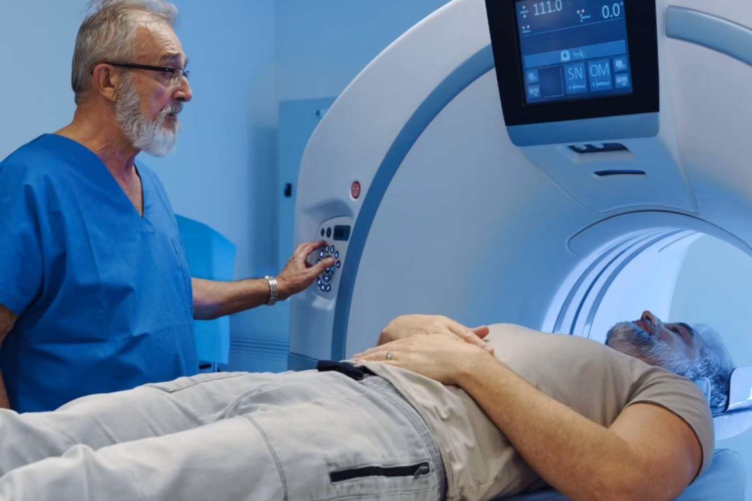 Healthcare professional preparing a patient for a non-contrast CT scan