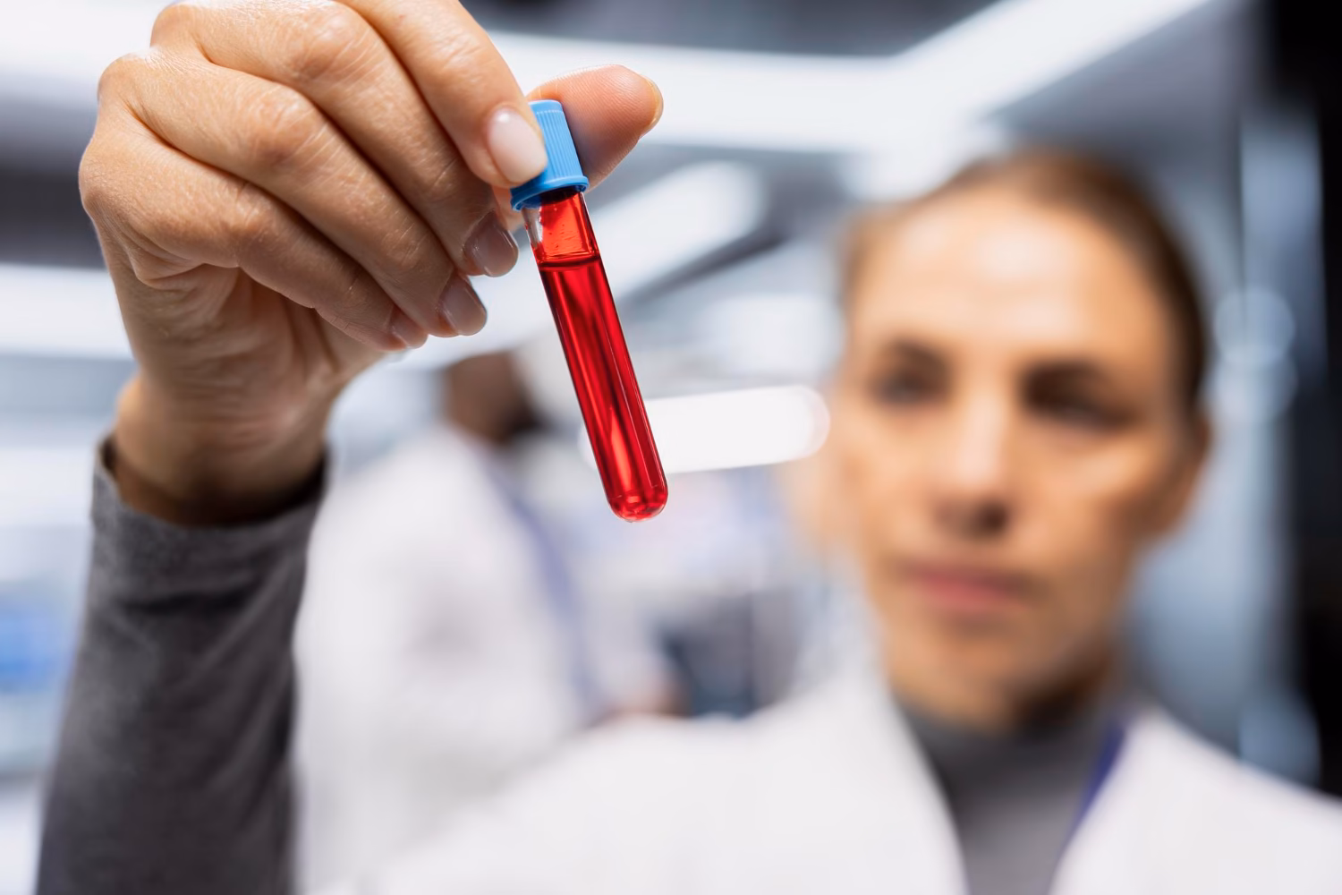 Doctor holding a blood test tube for a vitamin profile blood test in Dubai